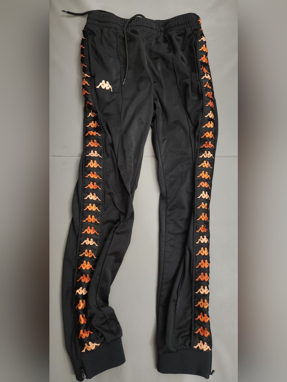 Kappa Men’s Black Track Pants with Orange Logo Tape
